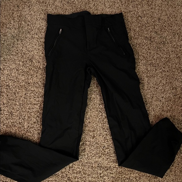 Athleta Pants - Athleta size 4 black pants. Stretchy. Pull-string cuff, pockets & side zippers.